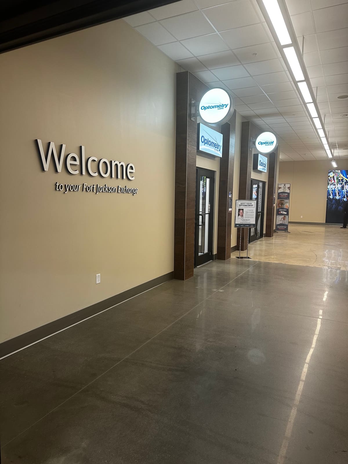 Hallway inside the Fort Jackson Exchange with the entrance to the eye care office